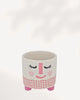 Small ceramic and clay Rosie Pot featuring a white, rosy pink, and charcoal accent color palette.
