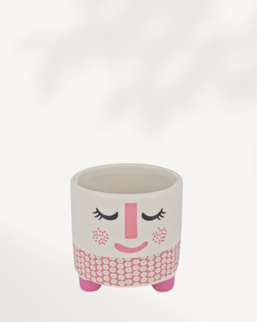 Small ceramic and clay Rosie Pot featuring a white, rosy pink, and charcoal accent color palette.